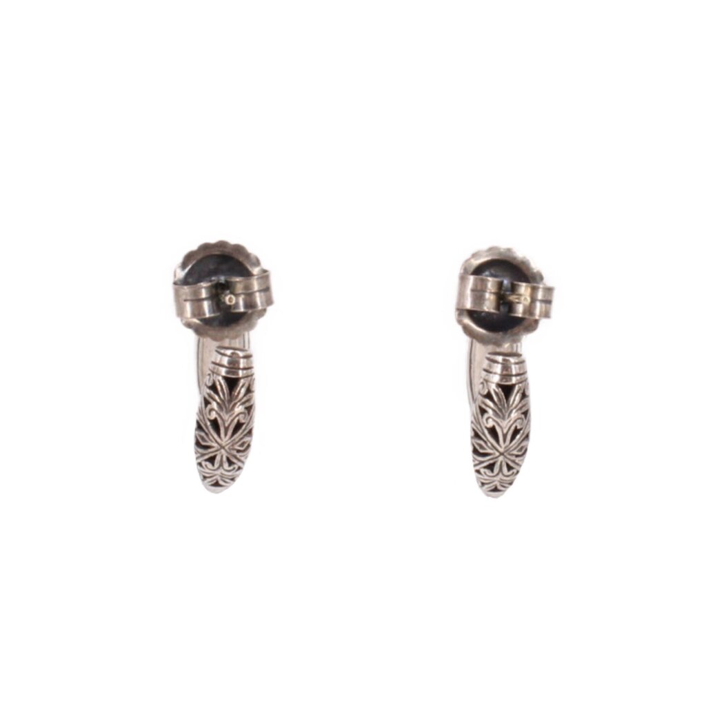 Sterling silver teardrop earrings with filigree detailing and top clasp hardware