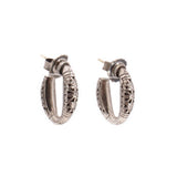 Sterling silver filigree hoop earrings with detailed side profile and clasp