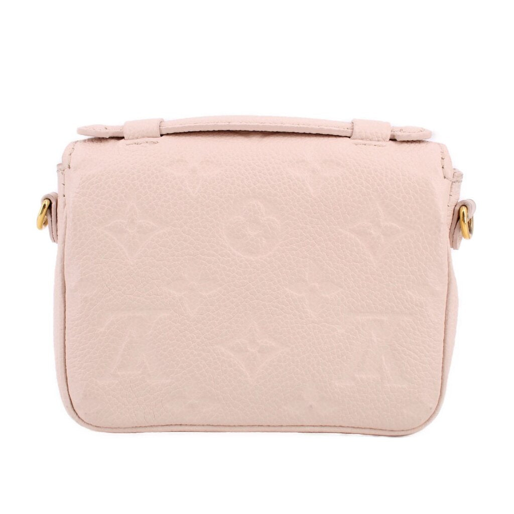 Cream Micro Pochette Metis crossbody back view with top strap and minimal hardware