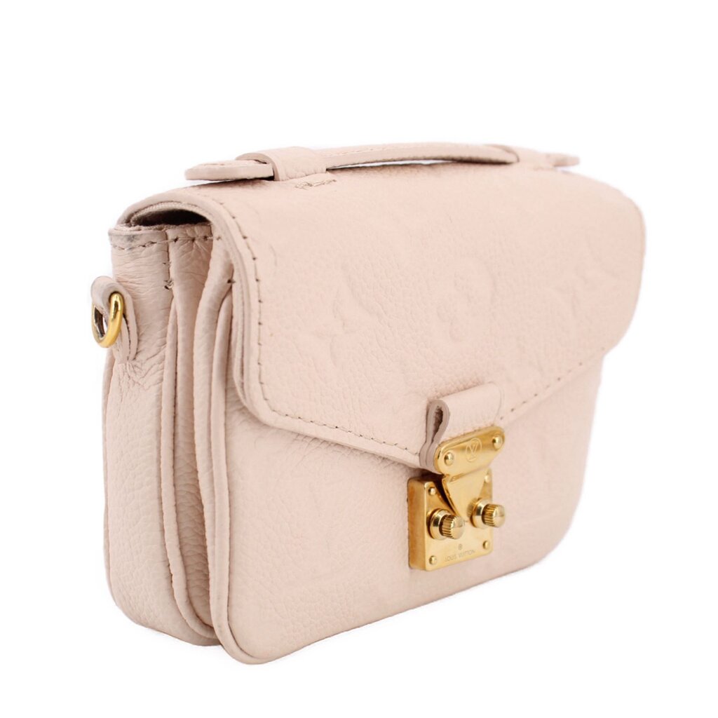 Cream Micro Pochette Metis crossbody side view with gold padlock-style clasp