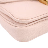 Cream Micro Pochette Metis crossbody seam and corner close-up showing flap lining edge