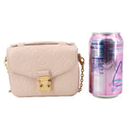 Cream micro crossbody bag side view with gold padlock-style closure