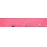 Pink leather edge with visible stitching on the crossbody bag
