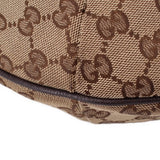 Brown GG canvas crossbody bottom edge with textured leather trim