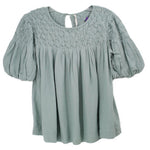 Light green blouse with smocked yoke, puff sleeves, and pleated bodice