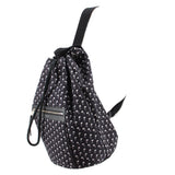 Black palm-print backpack, 3/4 view with drawstring cords and front zip pocket