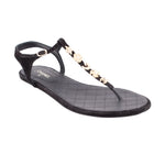 CHANEL black thong sandals with quilted footbed and gold charm strap detail