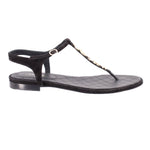 CHANEL black thong sandals with low heel and gold charm ornament on strap