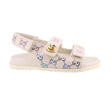 Side view cream sport sandals with rhinestone floral pattern and gold-tone buckle