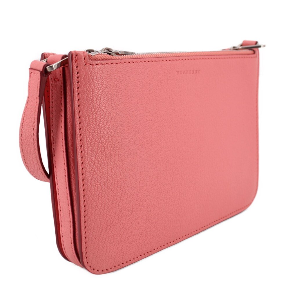 Pink crossbody bag, textured leather, top zip closure and slim shoulder strap