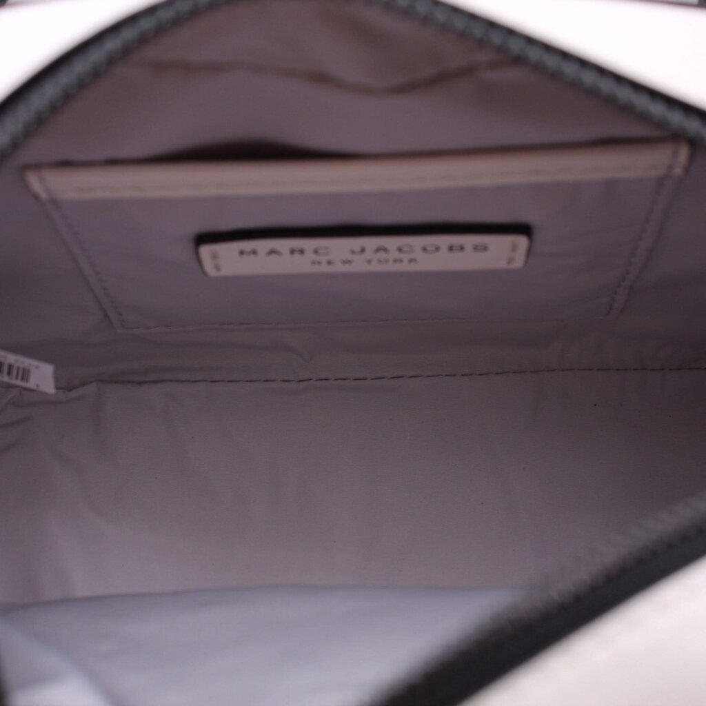 Inner lining view of the two-tone camera crossbody bag