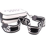 Two-tone camera crossbody bag with wide logo webbing strap and metal hooks