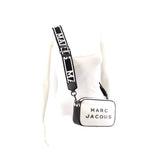 Camera crossbody bag worn with white logo webbing strap and small zip pouch