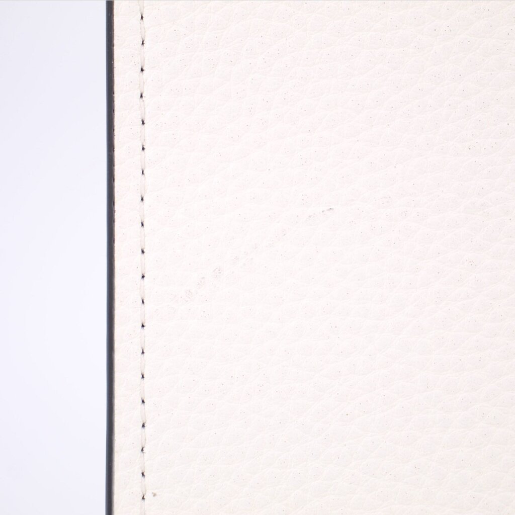 Close-up of white leather exterior with visible stitching along the edge