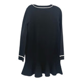 Black swing dress with contrast trim at neckline and cuffs, 3/4 length sleeves