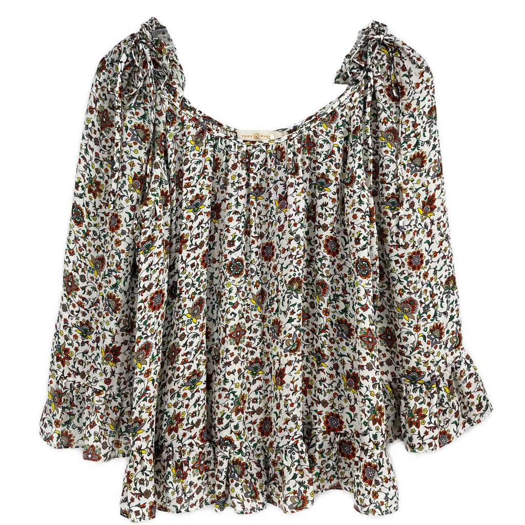Beige floral blouse with gathered scoop neckline and puff sleeves, ruffled hem