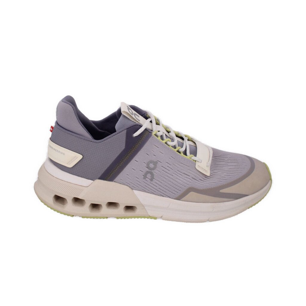 Gray running sneakers with white laces, cream heel panel, lime detailing on outsole