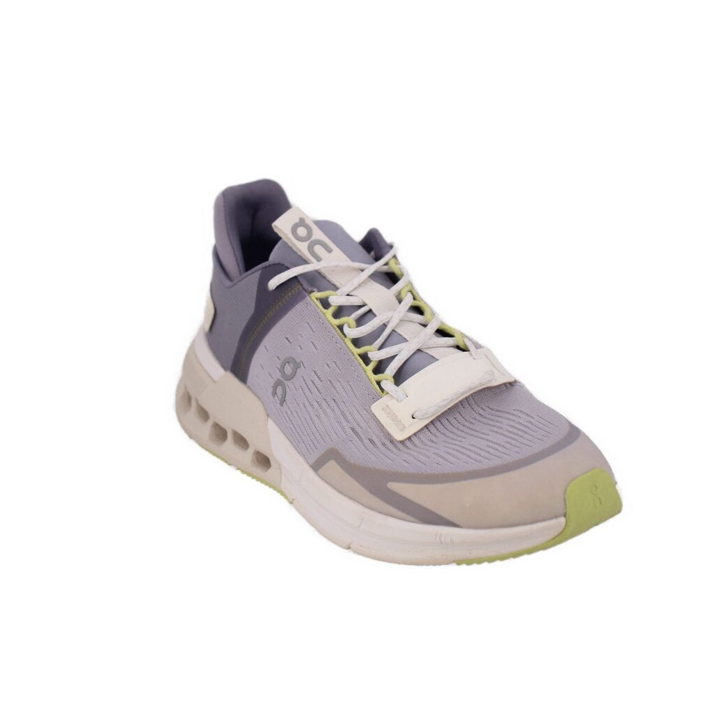 Gray knit running sneakers with white laces and lime accents, chunky cushioned sole