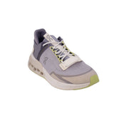 Gray knit running sneakers with white laces and lime accents, chunky cushioned sole