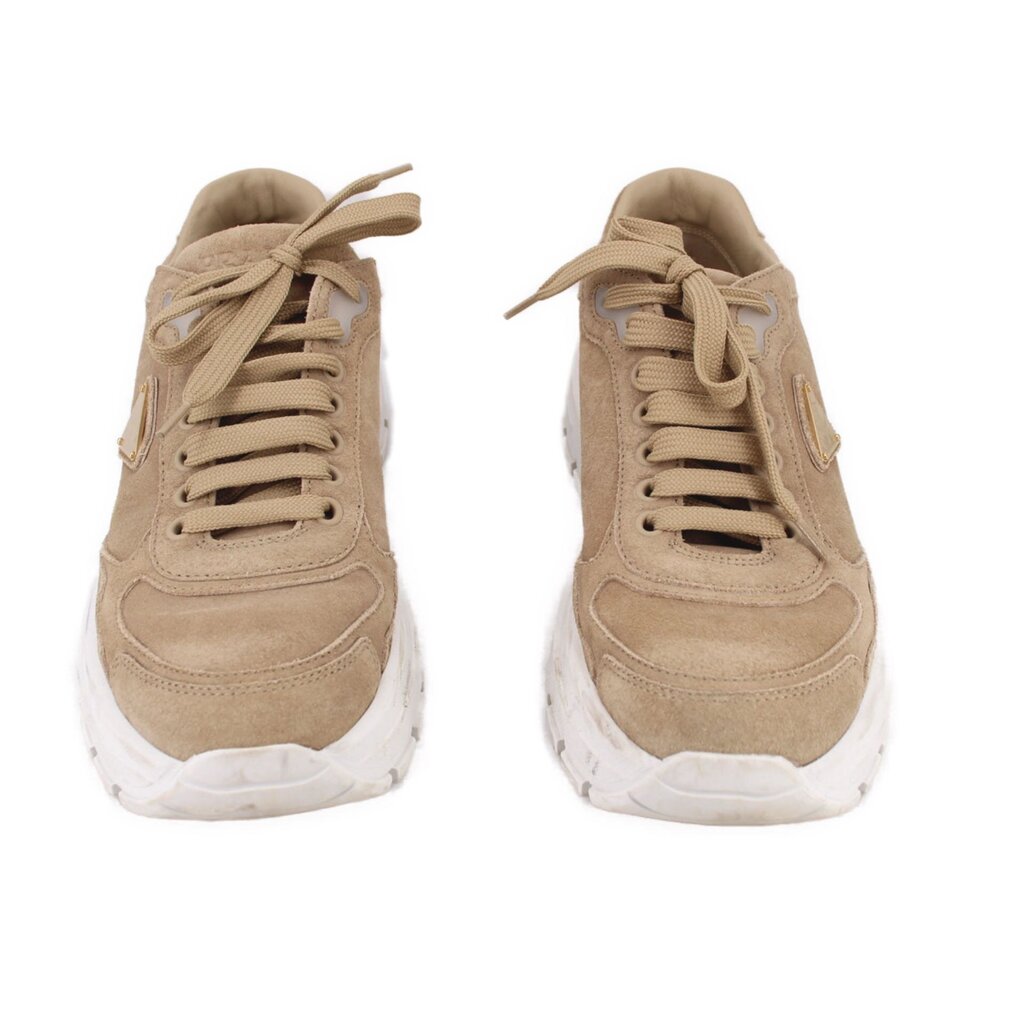 PRADA tan suede sneakers, rear view with lace-up heels and white cushioned soles