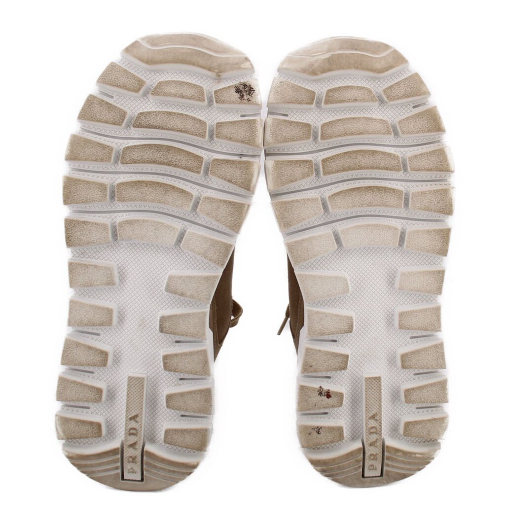 PRADA tan suede sneakers outsole view with textured white rubber tread