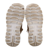 PRADA tan suede sneakers outsole view with textured white rubber tread