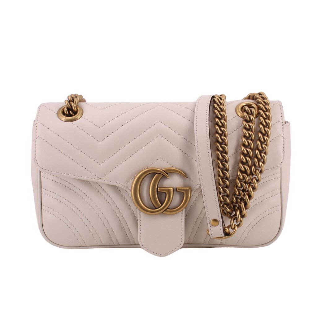 Cream quilted medium shoulder bag with chevron pattern and gold-tone GG clasp, chain strap