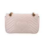 Cream chevron quilted medium shoulder bag with two top ring details