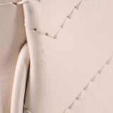 Cream quilted leather panel with stitched edge detail