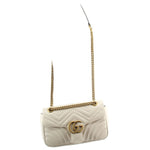 Cream medium shoulder bag with GG clasp, chevron quilting, gold chain strap