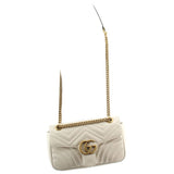 Cream medium shoulder bag with GG clasp, chevron quilting, gold chain strap