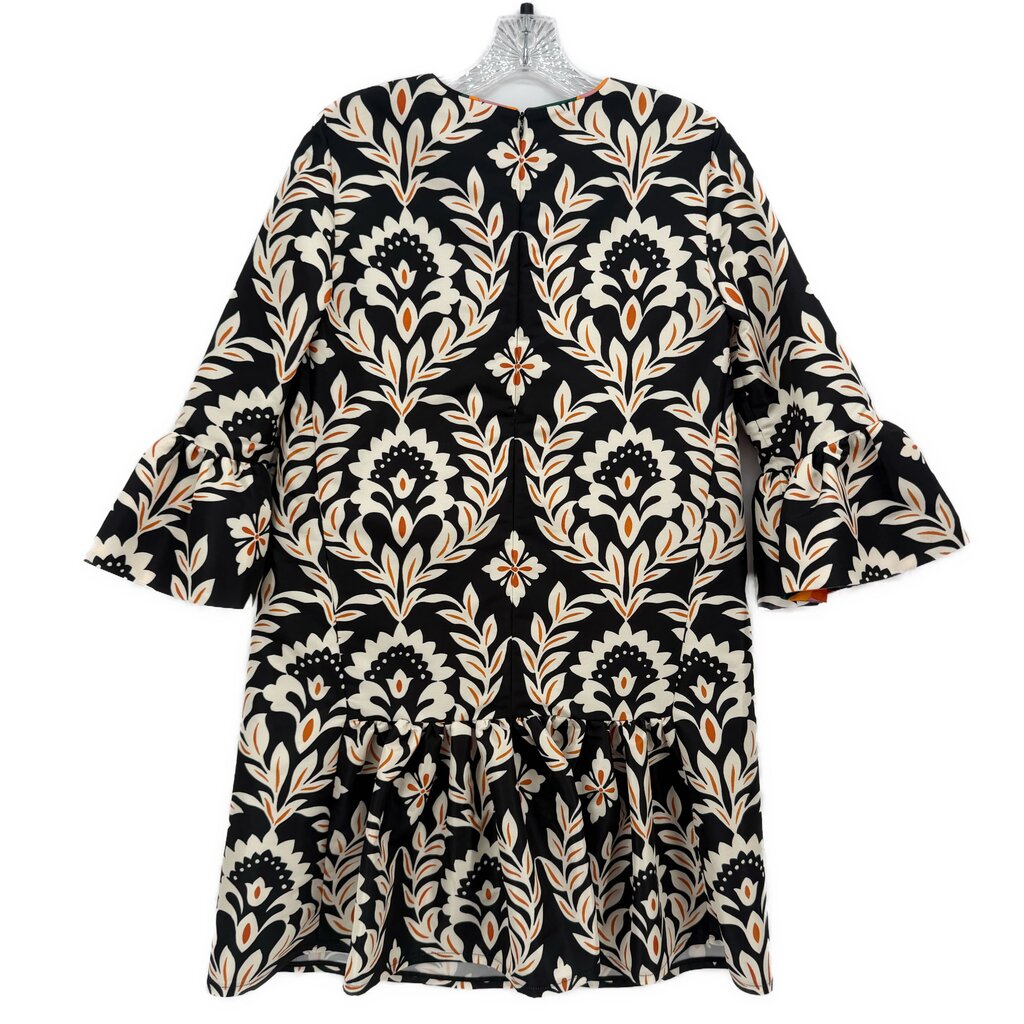 Black printed dress with short bell sleeves and ornate floral damask pattern, back view.