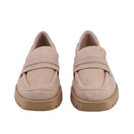 Pair of tan suede loafers, penny-style strap across the vamp, chunky sole