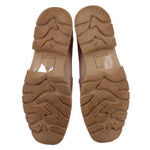 Tan suede loafer outsoles with textured tread and slip-resistant lug pattern