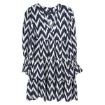 Blue and white zigzag ruffle dress with long sleeves and tiered skirt