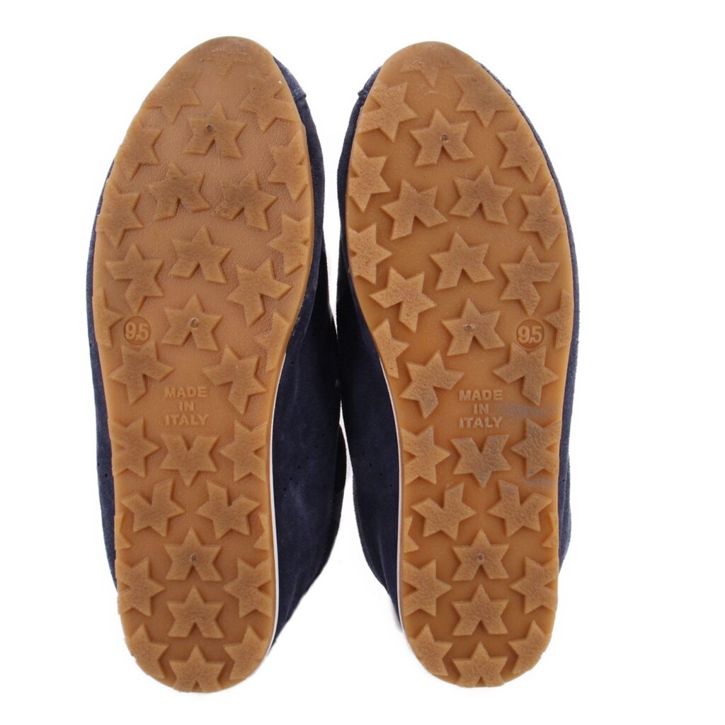 Shoe outsole with tan star-pattern tread and 'MADE IN ITALY' text