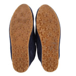 Shoe outsole with tan star-pattern tread and 'MADE IN ITALY' text