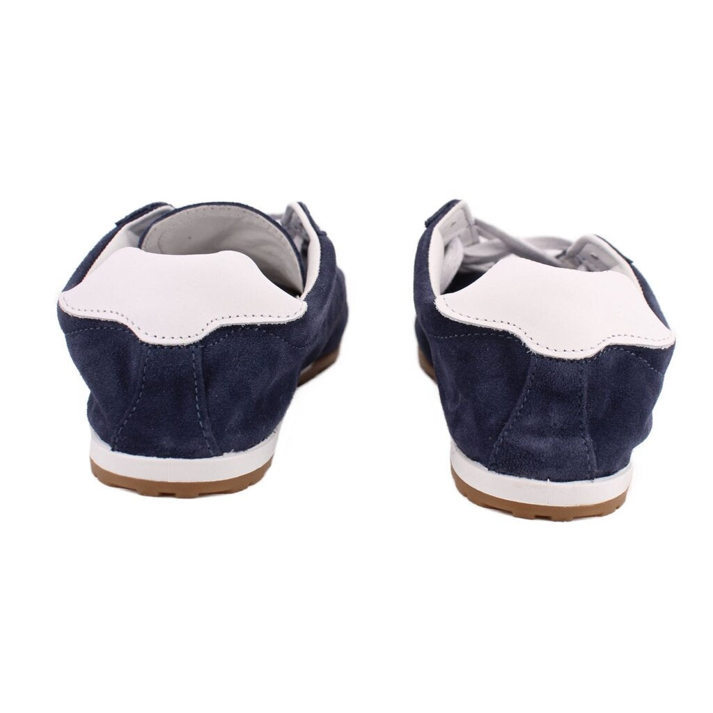 Back view of blue suede sneaker with white collar trim and gum sole