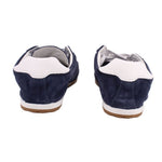 Back view of blue suede sneaker with white collar trim and gum sole