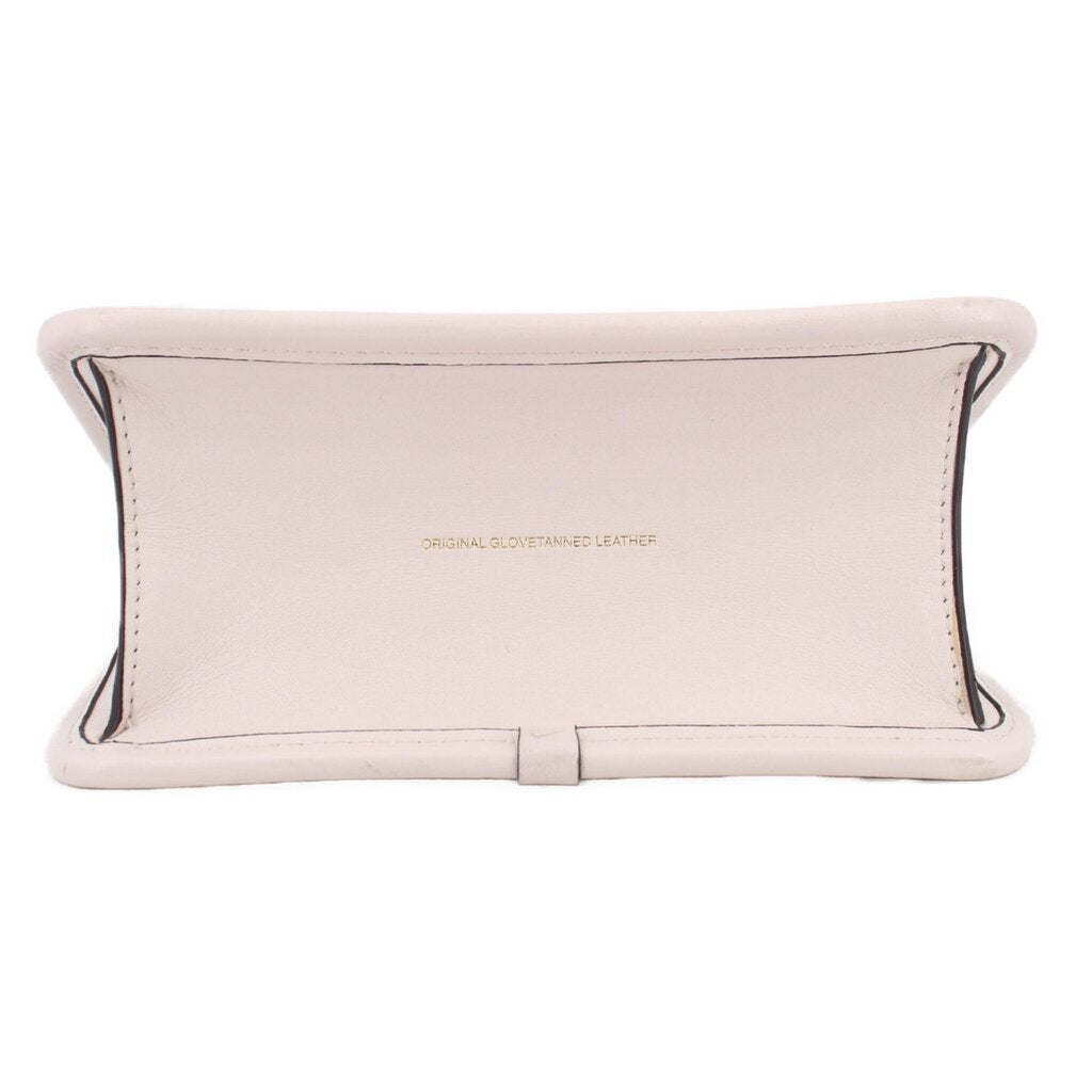 Cream leather back panel with embossed text and central strap loop