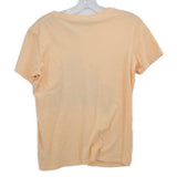 Peach short-sleeve top with plain back
