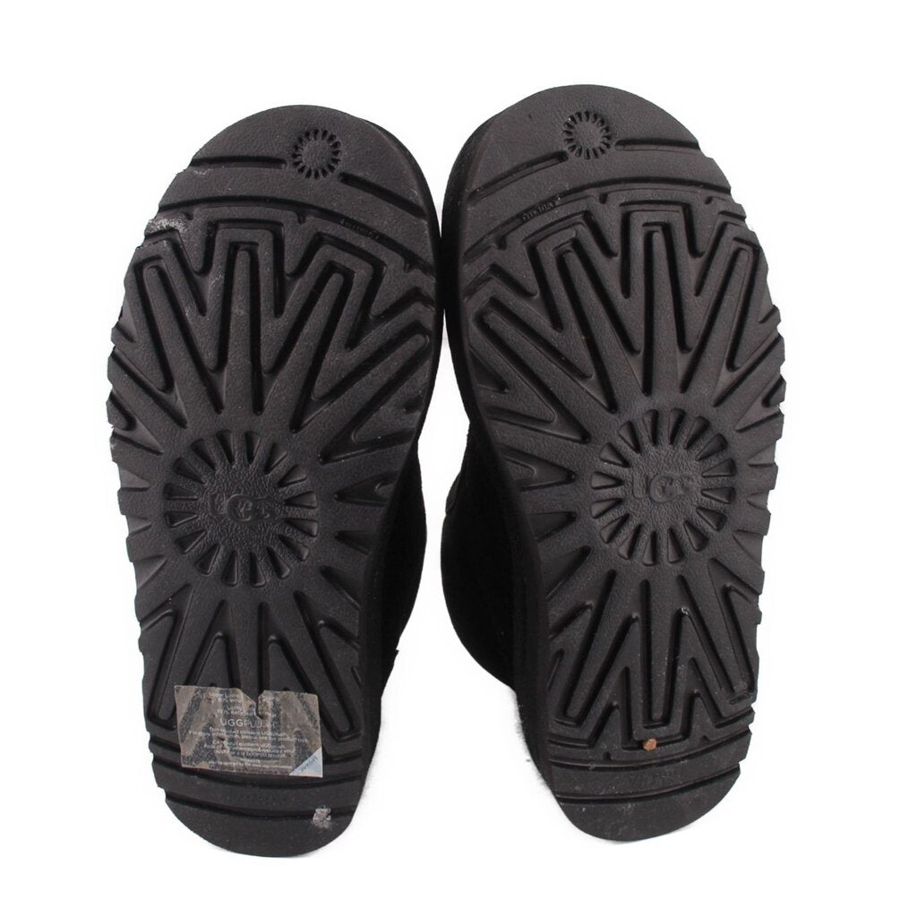 UGG black platform bootie outsoles with deep tread pattern for traction