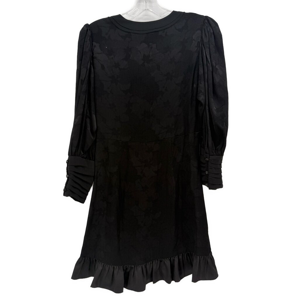 Black long-sleeve dress with crew neckline, gathered waist, puff sleeves, ruffled hem