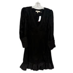 Black long-sleeve dress with V-neck, ruched bodice, puff sleeves, ruffled hem