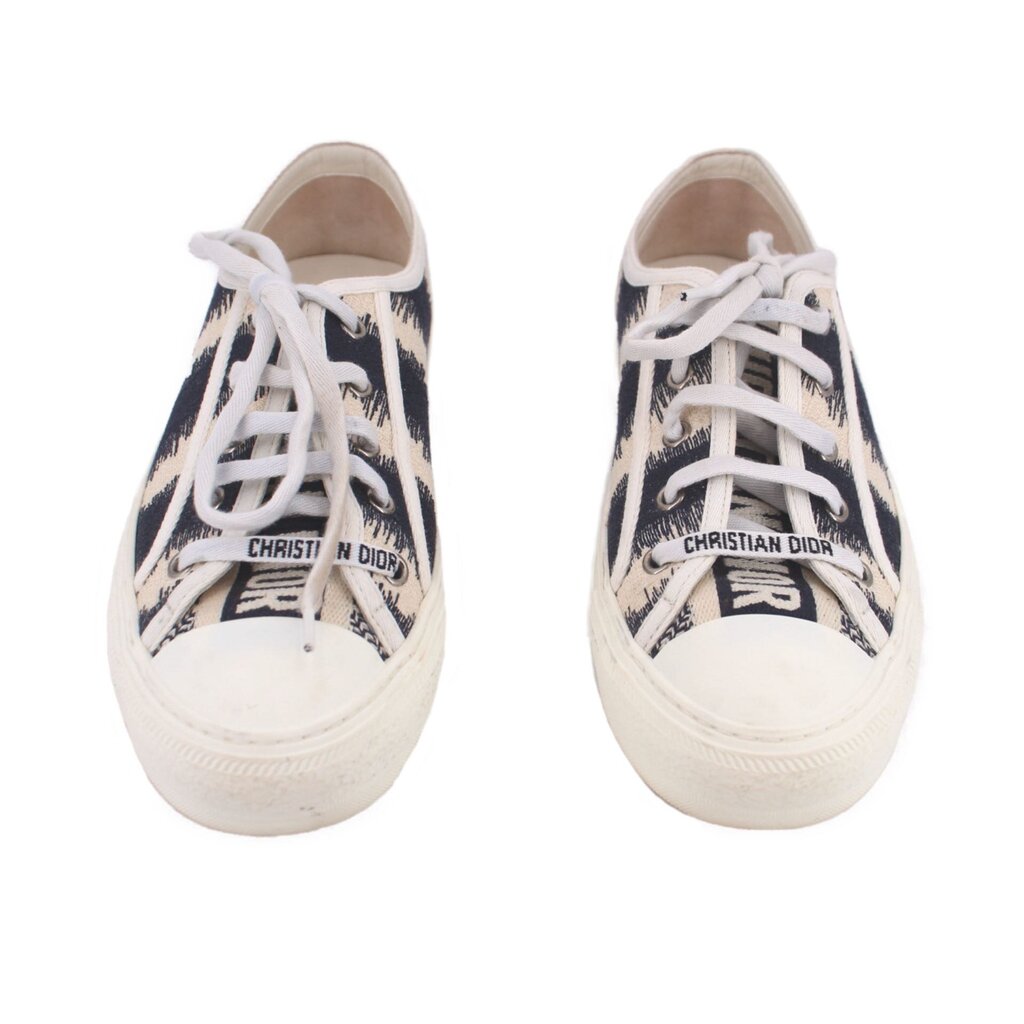 Pair of lace-up low-top sneakers with black-and-white D-Stripe uppers, DIOR patch