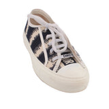 Black and white D-Stripe low-top sneakers with lace-up front and DIOR label