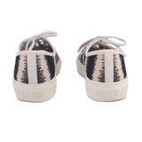 Back view lace-up sneakers with black-and-white stripe heel panel and DIOR branding