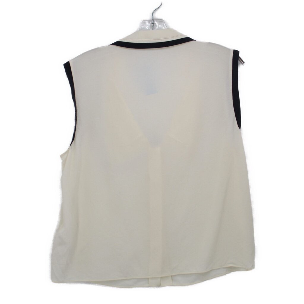 Cream sleeveless top with black collar trim shown from the back