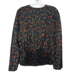 Black floral pleated blouse with long sleeves and crew neckline