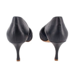 Navy leather stiletto heels with slender heels and curved counter
